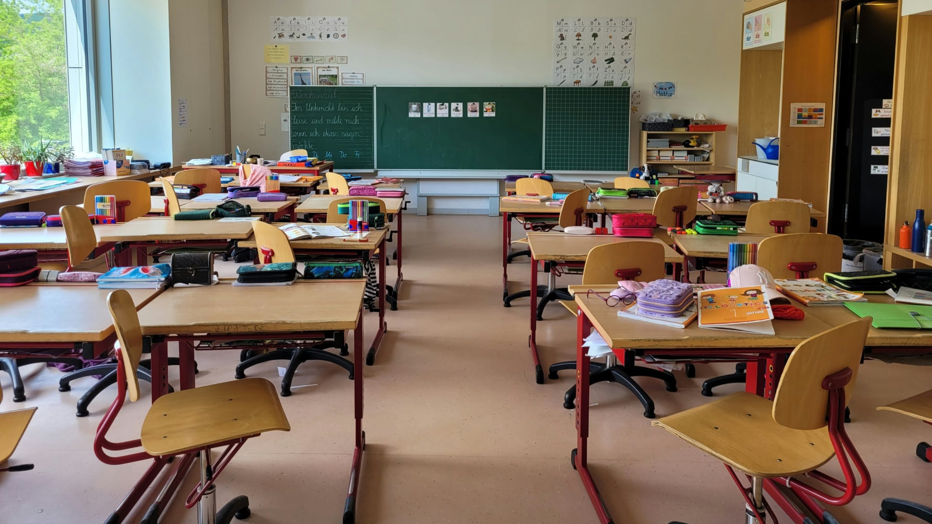 A stock photo showing an empty classroom. (Unsplash/ Nathan Cima)