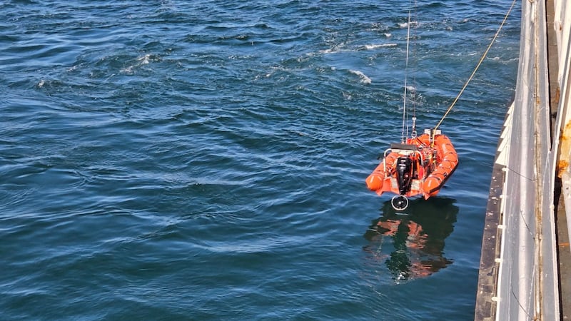 Two people rescued near ferry terminal after fishing boat sinks
