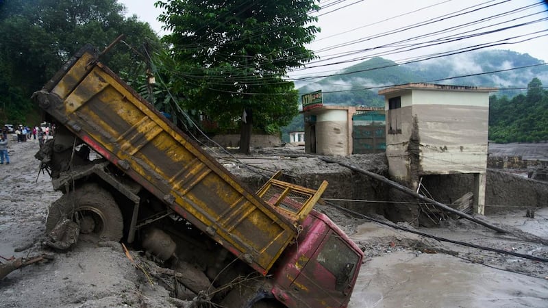 Catastrophic floods kill over 390 in Nepal and Tibet, with more than 1,400 missing