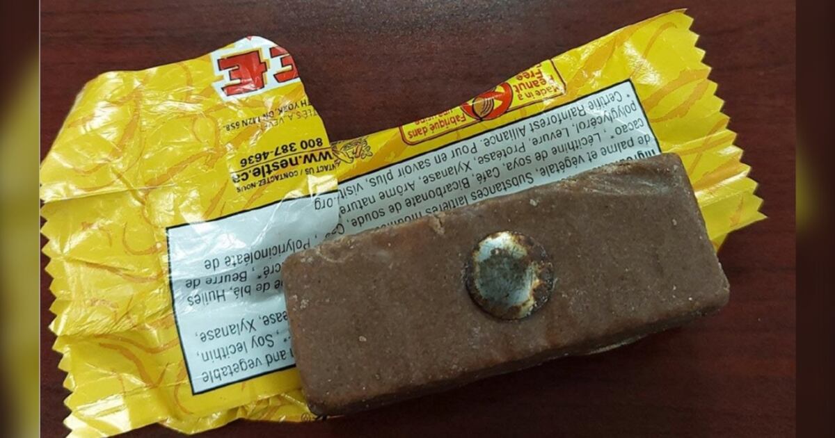 Thumback Mini Rusty thumb tack found in mini chocolate bar after trick-or-treating in ...