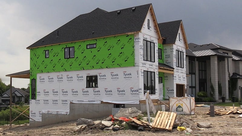 London might slash development charges by 50%, but application to $8.8B program still vague