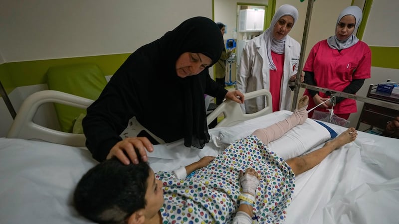 Israeli airstrikes on a village in southern Lebanon kill 12 people, including 2 children