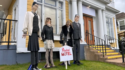 Scarecrows are pictured.