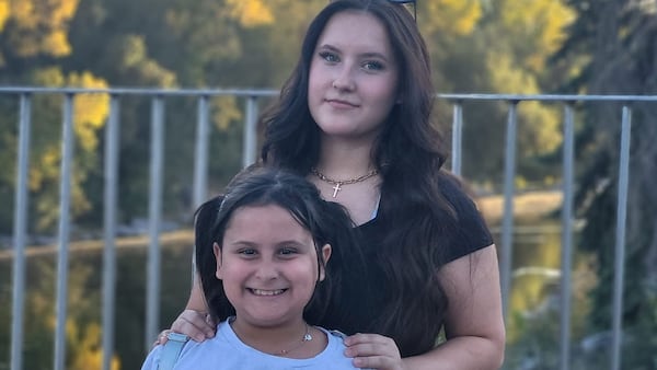 Family of two girls hit by minivan calling for change to northwest Calgary intersection