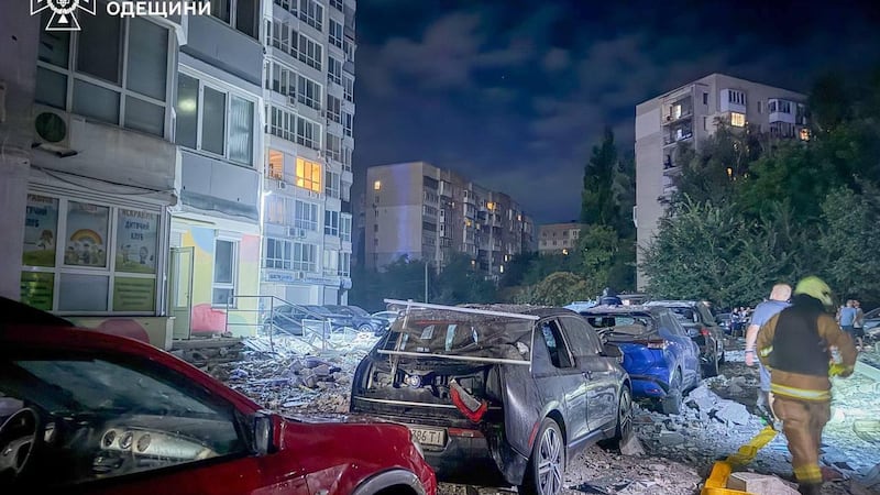 Russian strikes kill 2 Ukrainian civilians as Moscow and Kyiv threaten to raise the stakes