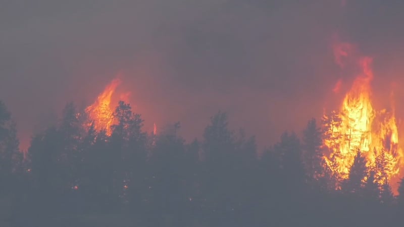 ‘Everything was orange’: Residents recall fleeing B.C. wildfire, as officials confirm structures lost