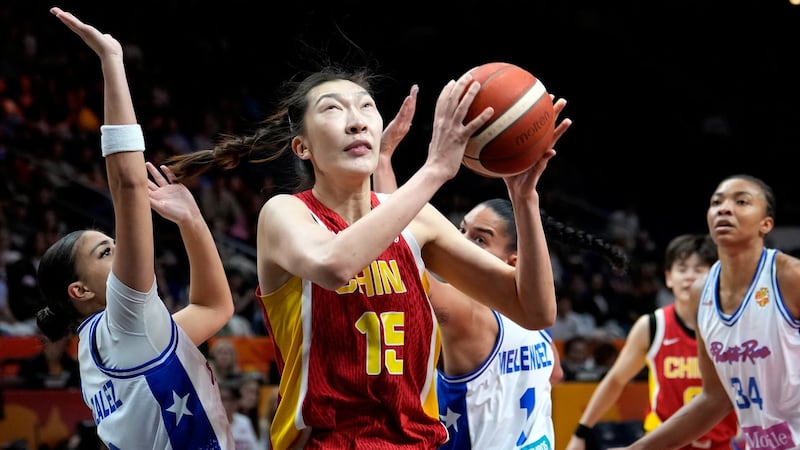 Han Xu powers China past Puerto Rico 75-72, sending them to a quarterfinal matchup with France