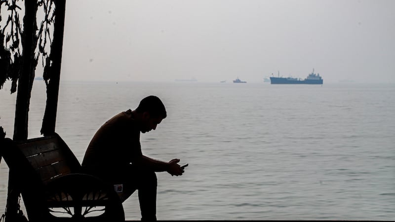 Iran says 7 oil tankers are on fire or damaged in a key strait as fears grow of a return to war