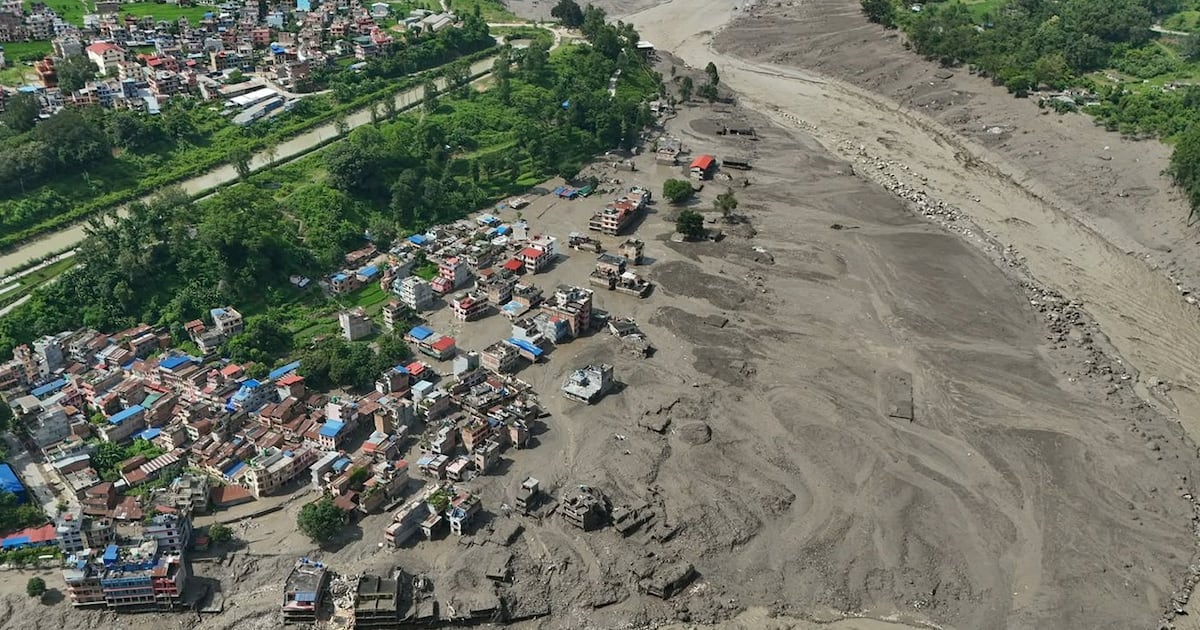 Photo: ctvnews.ca Damaged houses stand precariously near the swollen, debris-choked banks of the Trishuli River after flash floods in Nepal