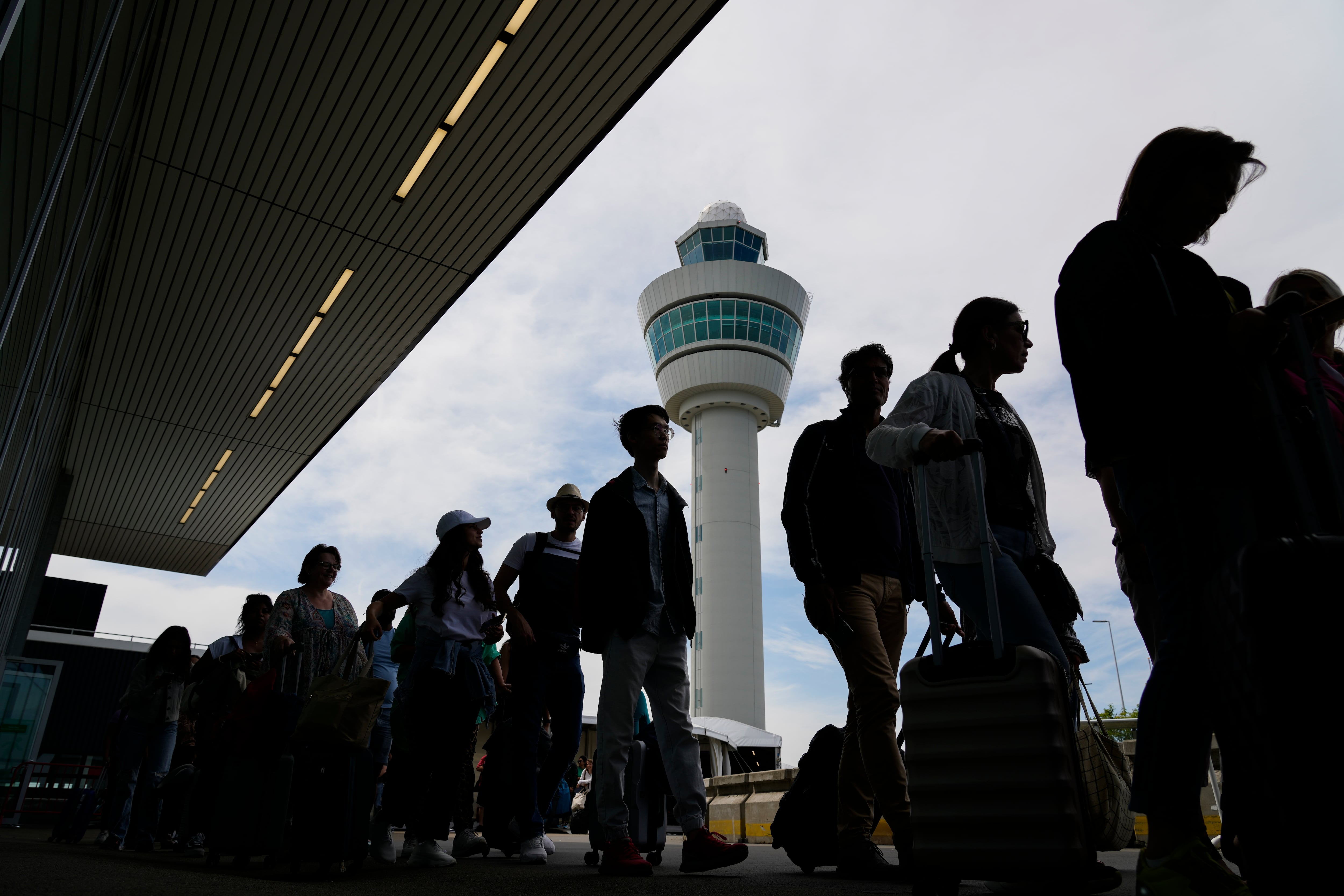 EU vows to resolve border check issues causing travel chaos | News ...