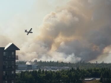 A fire is pictured burning in the  Julius Boulevard and Dugger McNeil Drive area of Bayers Lake, N.S., on Aug.12, 2025. (CTV Atlantic / Callum Smith)