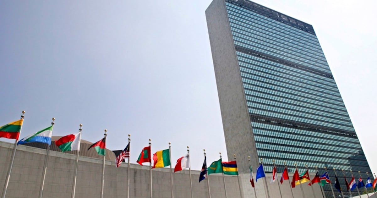 The flags of member nations fly outside the General Assembly building at the United Nations headquarters in New York, Sept. 13, 2005. (AP / Adam Rountree)