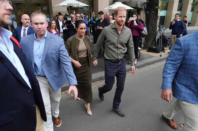 Prince Harry and Meghan arrive in Australia for privately funded visit