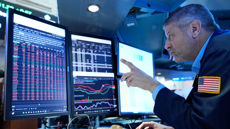 Wall Street holds near its record after Brent oil falls below US$100 per barrel