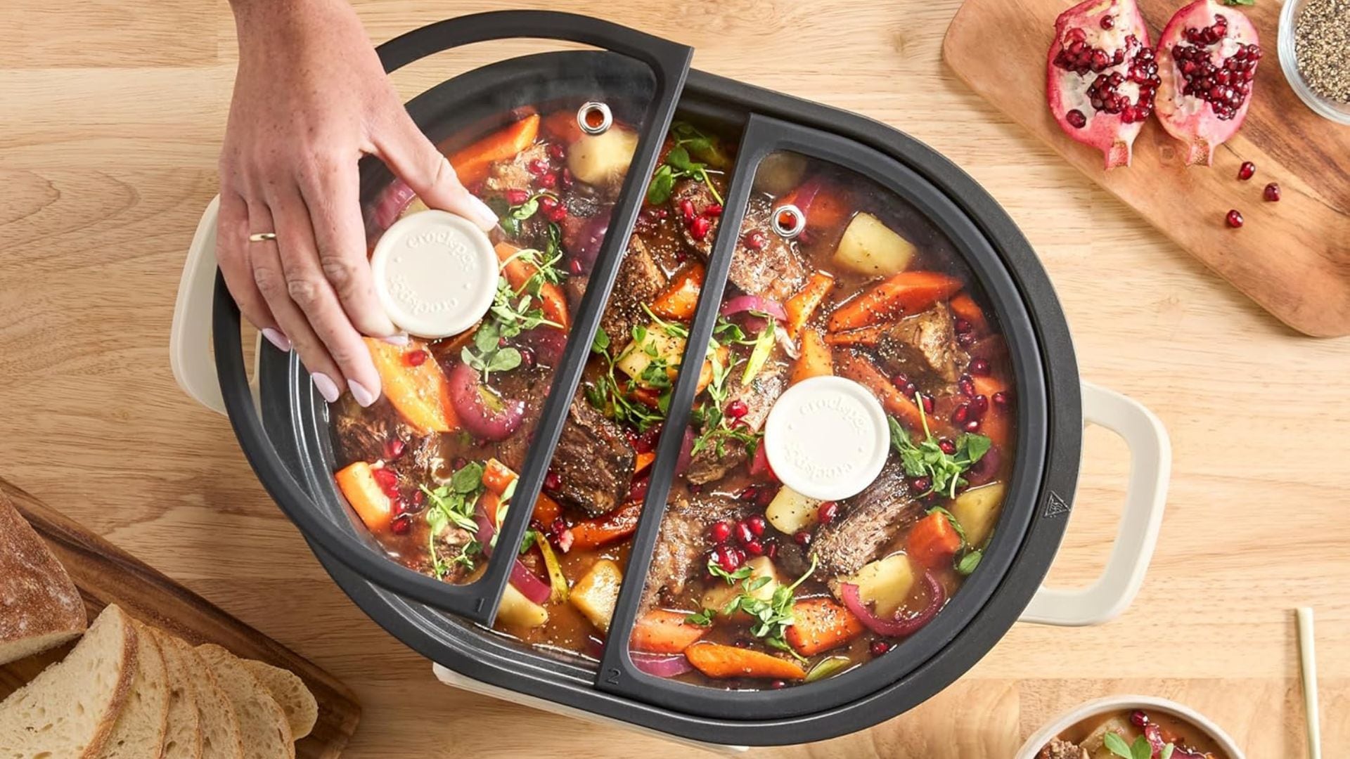 A person lifting a clid off a Crock-Pot slow cooker.
