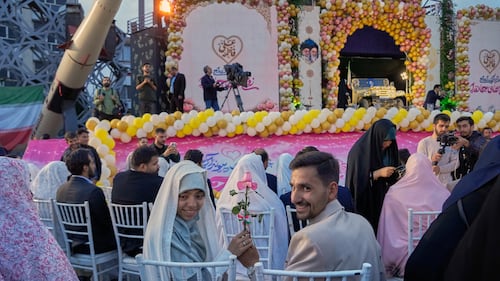 Iran stages mass weddings for couples ready for war ‘sacrifice’