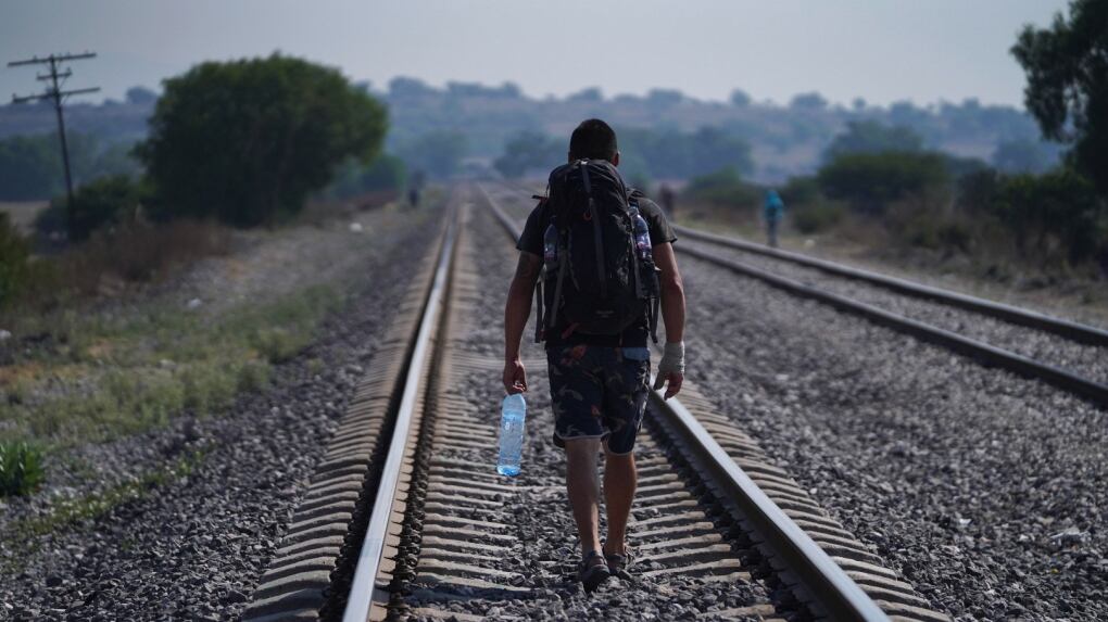 Migrant Train Riders Mexican railway operator halts trains because so many migrants are ...