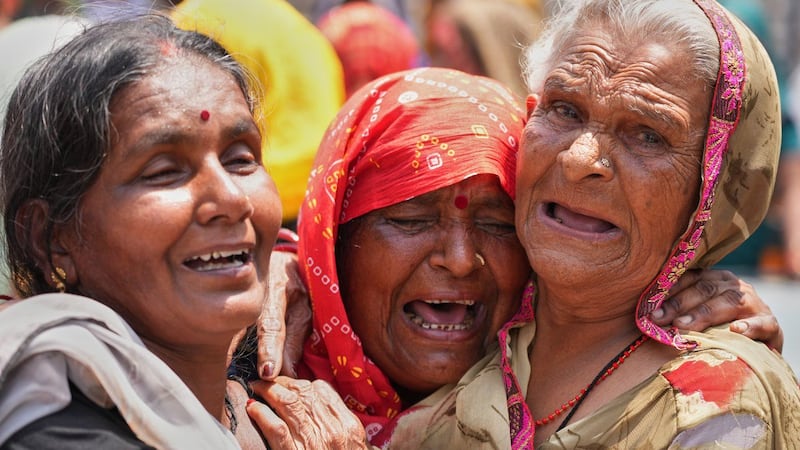 Dust storms and lightning kill at least 96 people in northern India