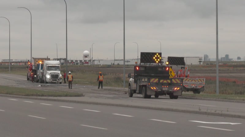 Semi-truck rollover closes off ramps on Stoney Trail: police