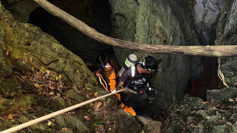 Heavy rains threaten to delay search for 2 people missing in Laos cave