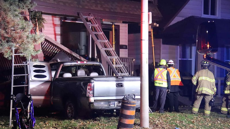 Truck drives into Riverside Drive East home