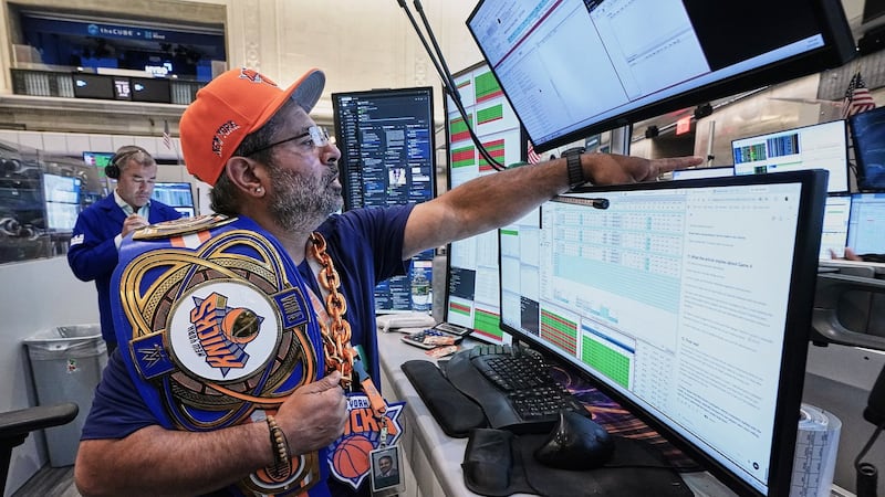 Stocks leap worldwide, and oil prices drop after the U.S. and Iran reach a tentative deal on their war