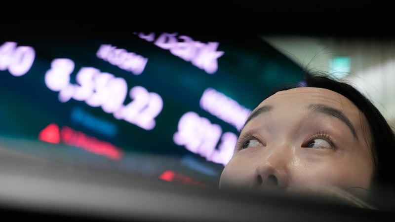 World shares are mixed, with South Korea's Kospi down nearly 8% on a sell-off of chip shares