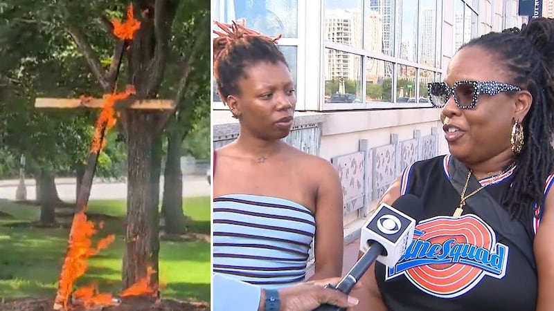 Police are investigating a large burning cross at a Chicago park