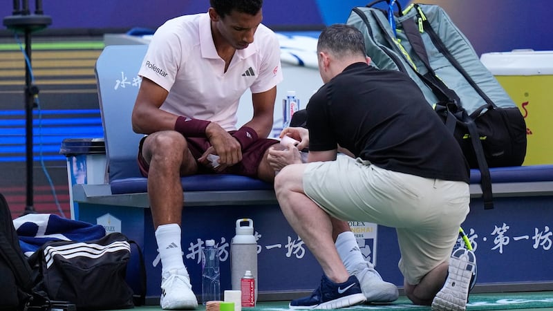 Canada's Auger-Aliassime retires with knee injury at Shanghai Masters