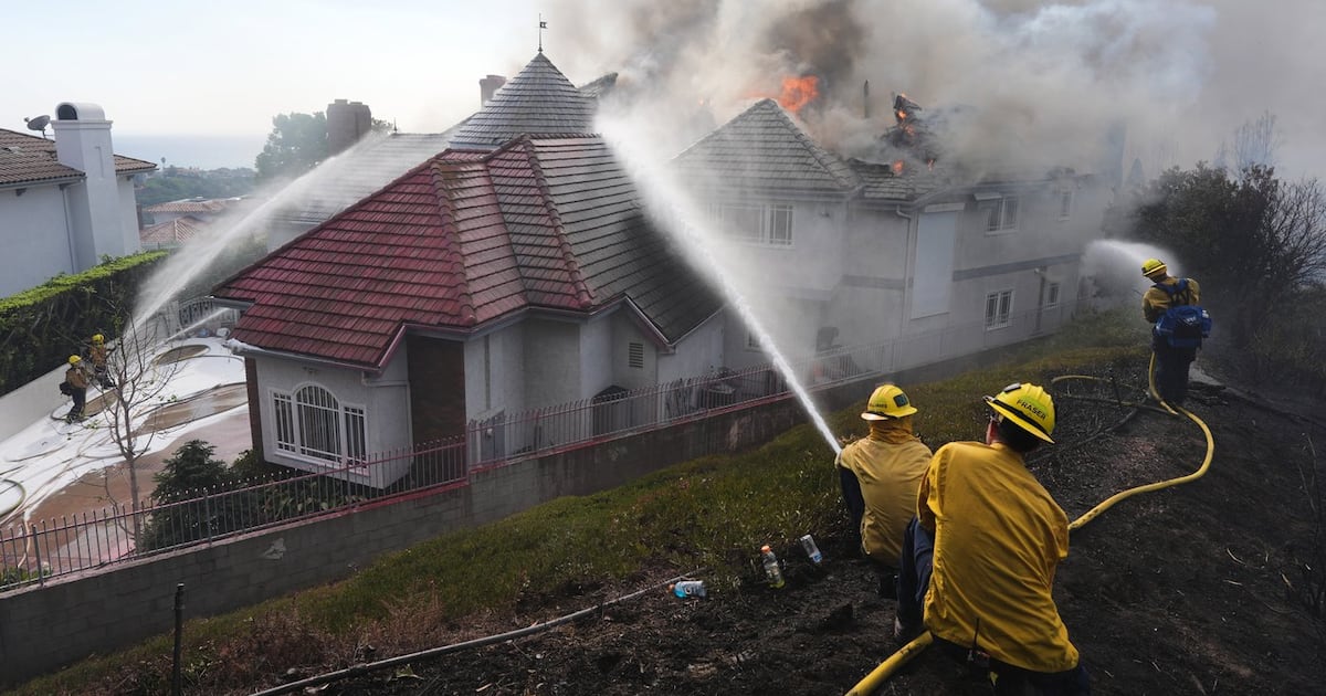 Multiple Southern California homes are ablaze in a fast-moving wildfire ...