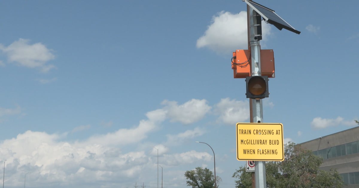 Train crossing message boards being installed