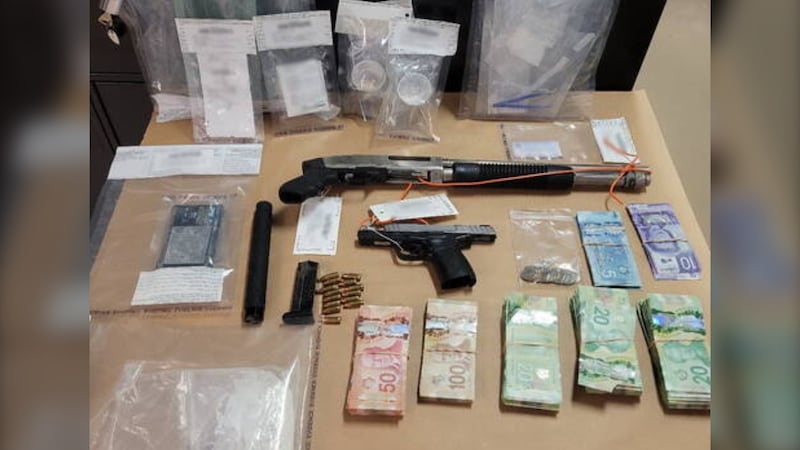 Police seize $29,000 cash, plus drugs and guns, during Prince George search