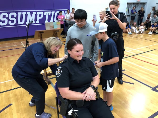 Windsor police officer donates hair for wigs for cancer patients