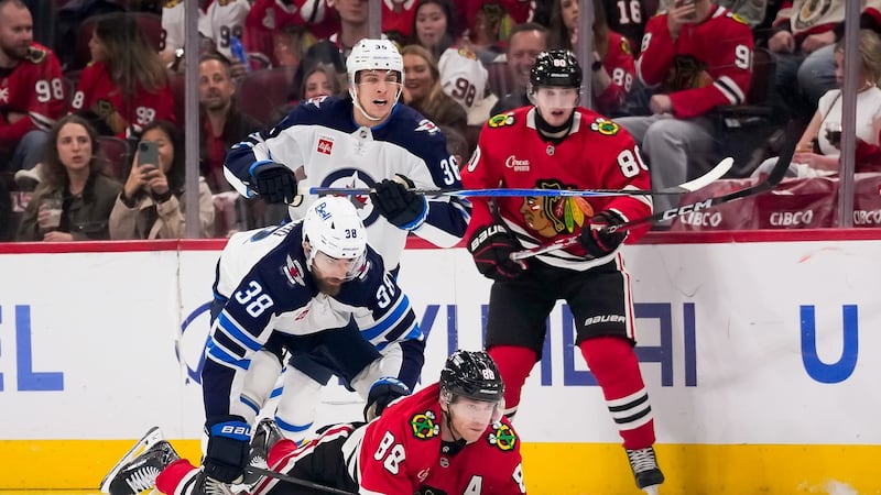 Levshunov scores in OT as the Blackhawks beat the Jets 4-3; Kane sets assists mark