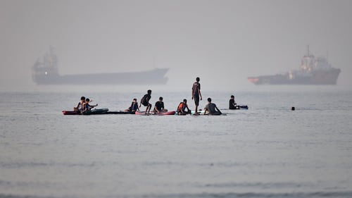 Kuwait says Iranian drones hit airport and killed 1 as ceasefire is tested again