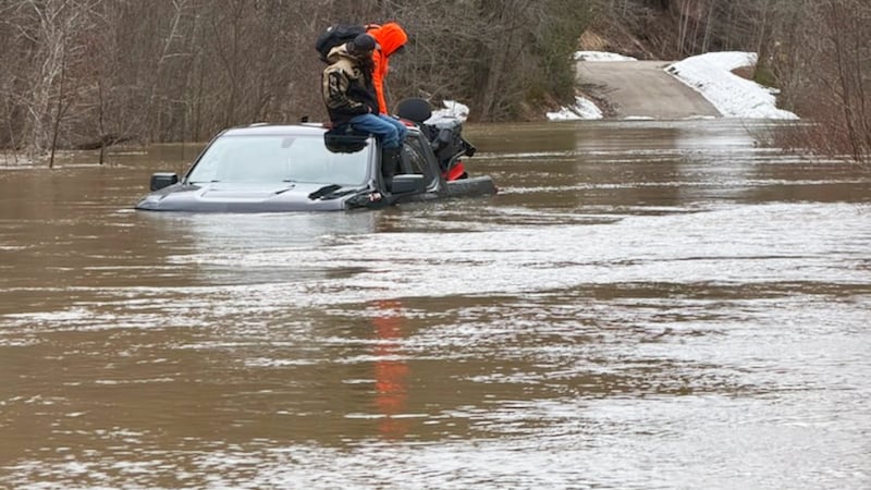 OPP rescue two people trapped on the roof of submerged vehicle near the Sault