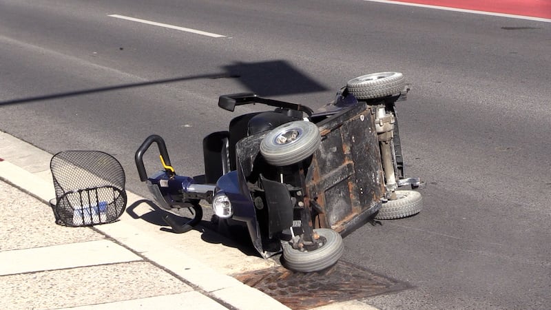 Elderly woman taken to hospital with serious injuries after motorized scooter collides with car