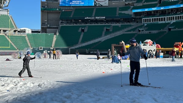 Regina’s Frost Festival features bouncy castles outside at Mosaic Stadium