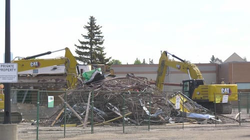 Heavy equipment is used to demolish Revolution Square, at Stony Plain Road and 151 Street in Edmonton, on June 8, 2026. (Evan Klippenstein / CTV News Edmonton)