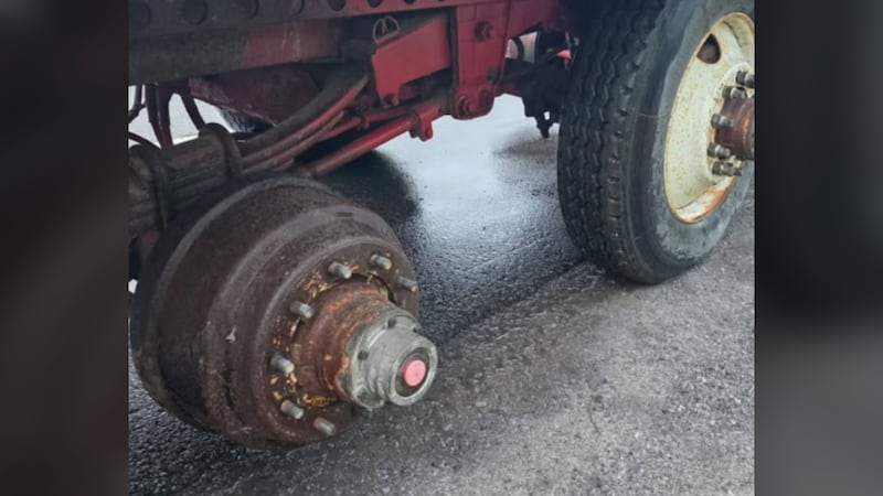 Ottawa police stop truck driver hauling trailer missing 10 wheels