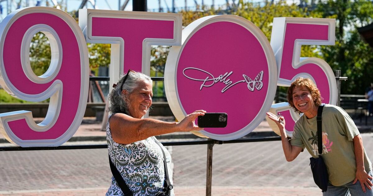 It's officially Dolly Parton Day, with parades, pink lights and book ...