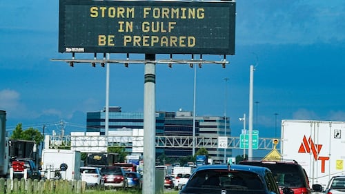 Edouard weakens into a tropical depression after landfall but still dumping rain into Texas