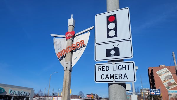 Officials debate red-light camera penalties for police officers