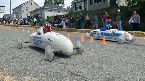 Soap box derby drivers are pictured.