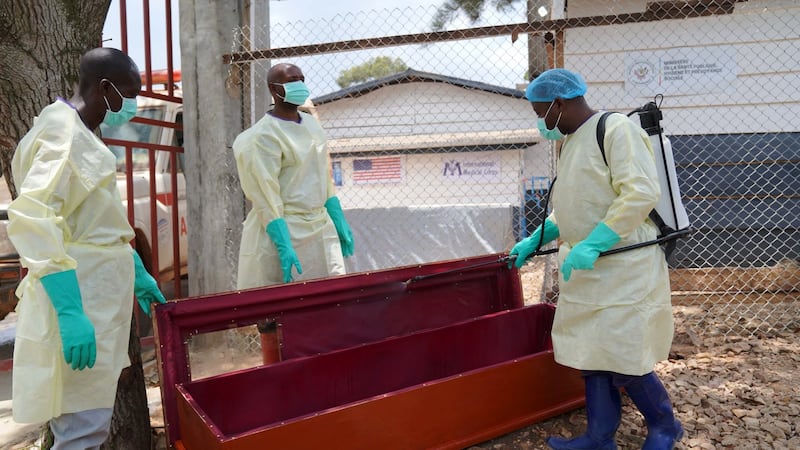 Congo’s Ebola burial teams battle community anger, fatigue and fear of infection