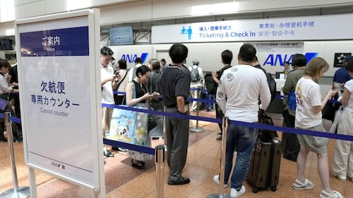 Tropical storm hits Tokyo area, leaving thousands without power before moving west