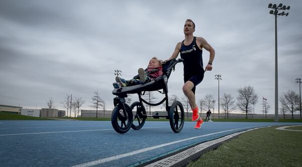 ‘That was unreal’: Toronto dad sets world record pushing his son in a stroller