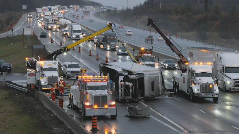 Tractor trailer tips over on Highway 401 ramp near Morriston