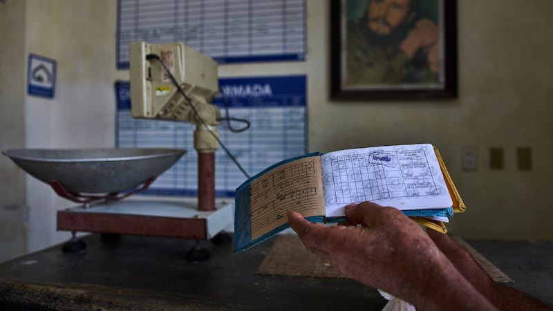Cubans struggle to survive on pocket-size government ration books as products dwindle