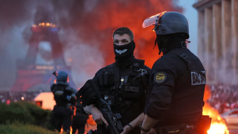 Paris police detain dozens after violence erupts during celebrations of PSG's Champions League title